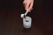Load image into Gallery viewer, reusable coffee pod refillable coffee pod scoop technique